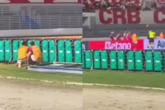 Jogadores do crb se escondem atrás de placas de publicidade